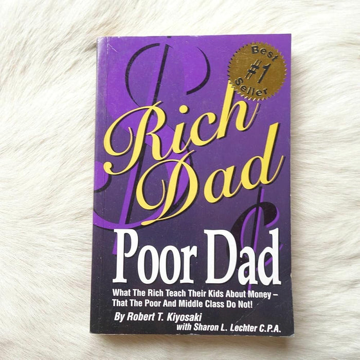 Rich Dad, Poor Dad: What the Rich Teach Their Kids about Money - That the Poor and the Middle Class Do Not! cover image
